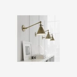 Boston Wall Light, Hand-Rubbed Antique Brass -AuraLiving Furniture Store 216223 boston lifestyle