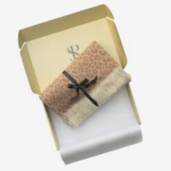 Wildcat Tan Throw -AuraLiving Furniture Store 306332 wildcat tan throw boxed 2