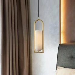 Melange Pendant Light -AuraLiving Furniture Store 328841 melange small elongated pendant in brass life