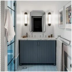 Selecta Wall Light -AuraLiving Furniture Store 340418 selecta long sconce in bronze and hand rubbed antique brass life 2